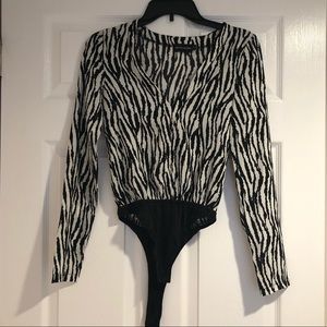 Pretty Little Thing Zebra Bodysuit!